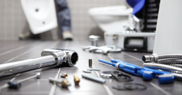 What industries does commercial plumbing serve?
