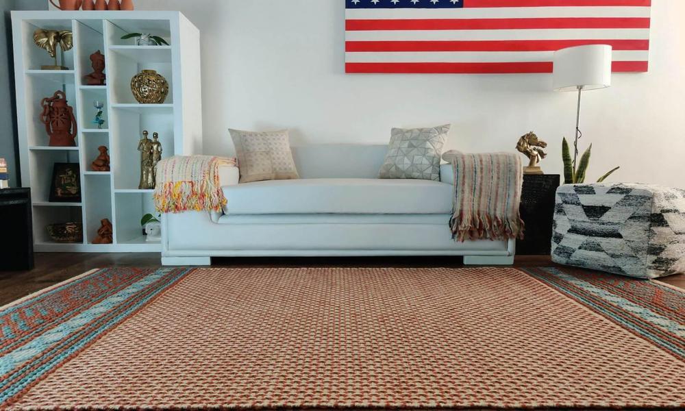 Why do people feel the pleasure with hand-tufted carpets?